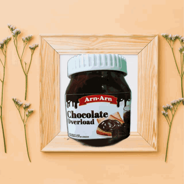 a jar of arn-arn chocolate overload in a frame