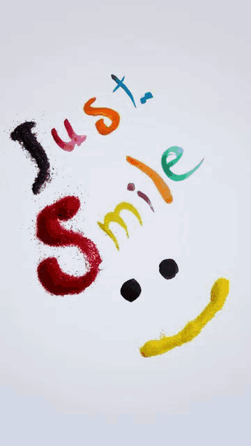 a smiley face with the words just smile written in different colors