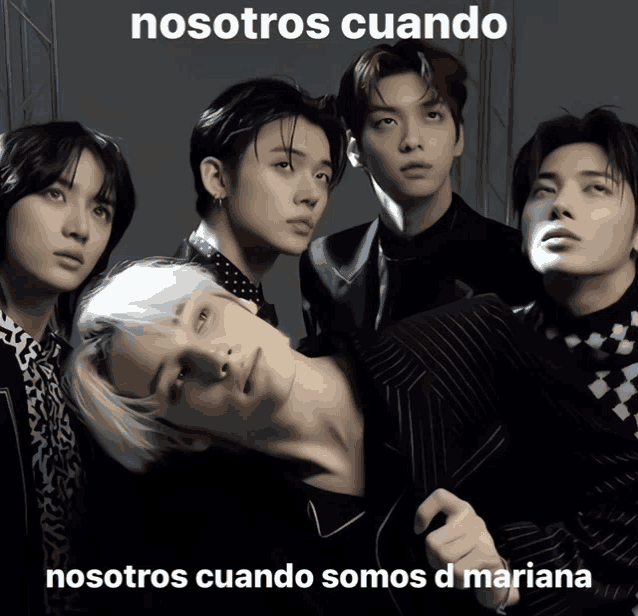 a group of young men are posing for a photo and the caption says nosotros cuando nosotros cuando somos d mariana