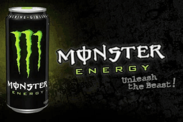 a can of monster energy is shown on a black background