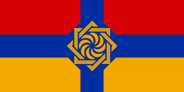 a red , blue and yellow flag with a yellow swirl in the middle .