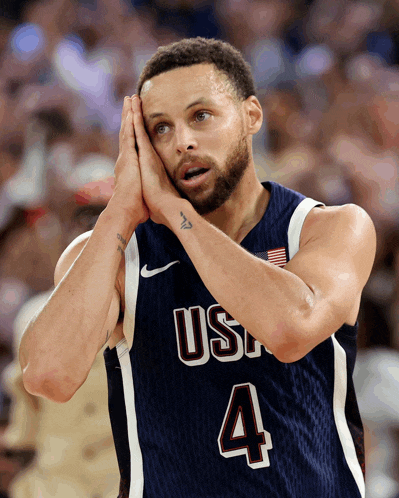 a basketball player wearing a jersey that says usa on it