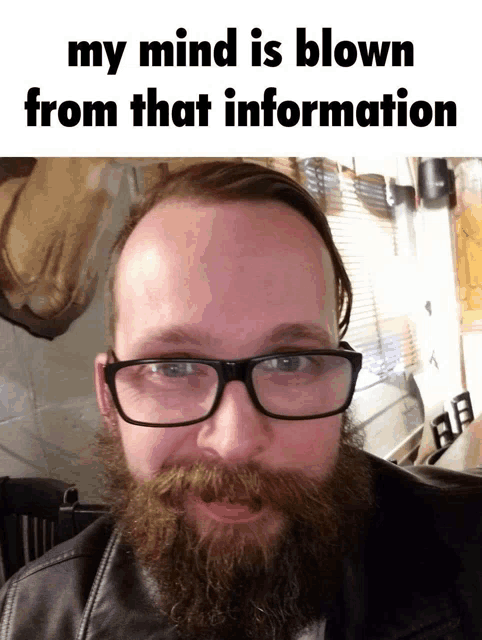 a man with glasses and a beard says his mind is blown