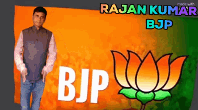 a man is standing in front of a sign that says bjp