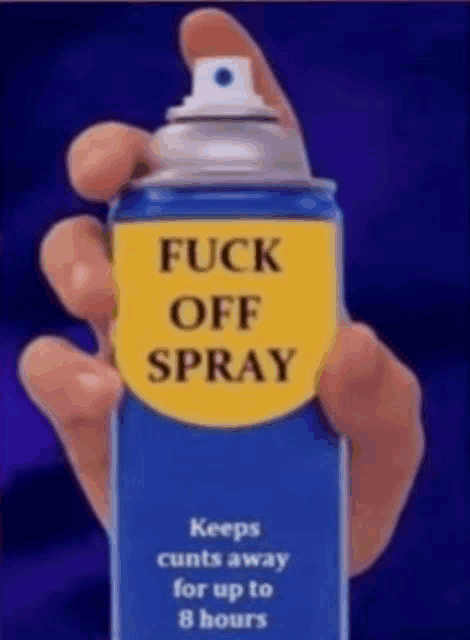 a person is holding a spray bottle that says fuck off spray