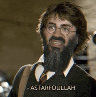 a man with a beard and glasses has the word astarfoulah on his shirt