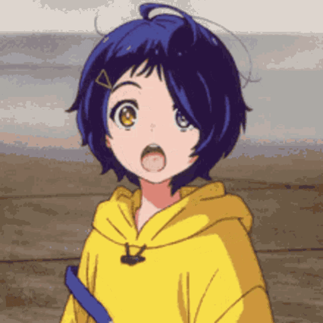 a girl with blue hair is wearing a yellow hoodie and a blue bag