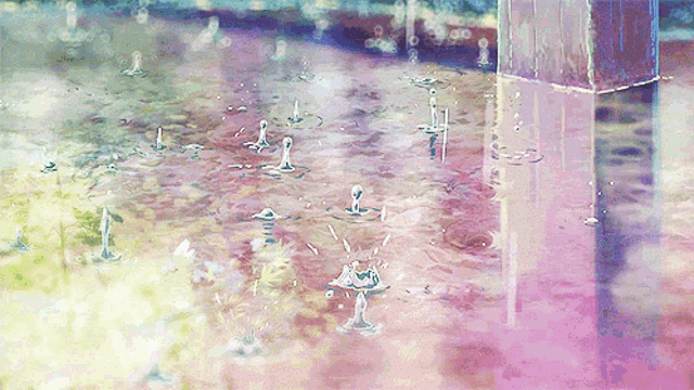 a painting of rain drops on a concrete surface