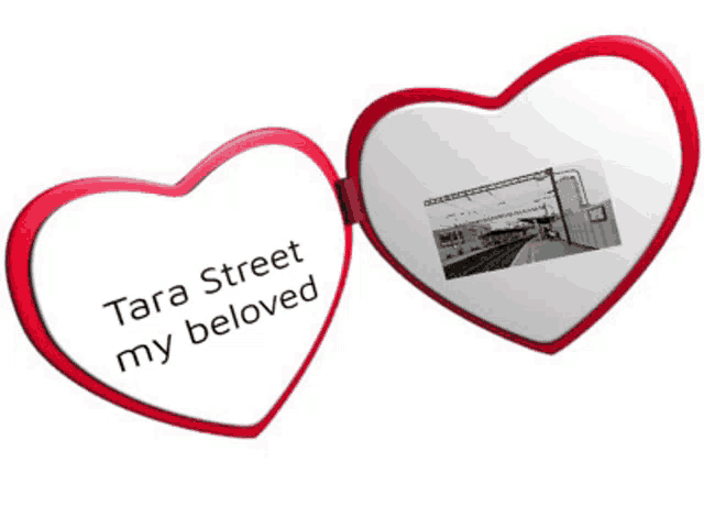 two heart shaped mirrors with tara street my beloved written on one