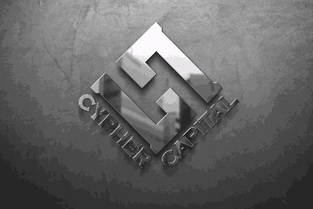 a logo for cypher capital is displayed on a concrete wall