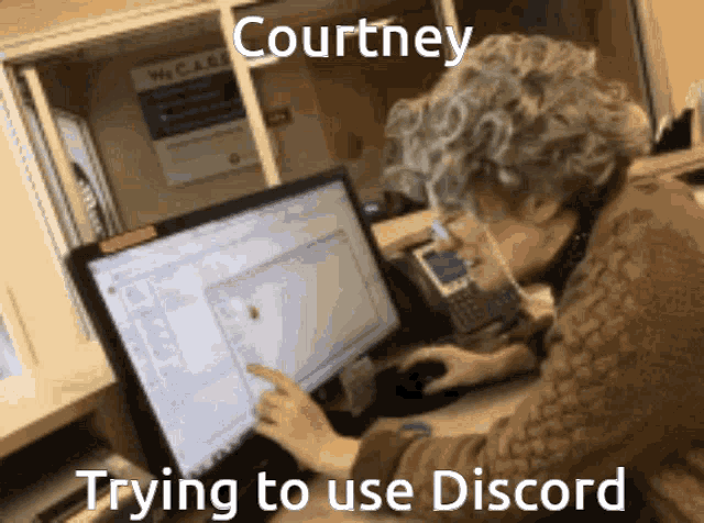 courtney is trying to use discord while looking at a computer screen