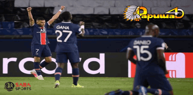 a soccer player with the number 27 on his jersey celebrates with his teammates