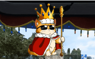 a cartoon cat wearing a crown and holding a staff