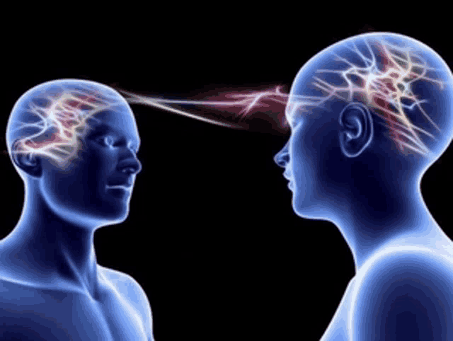 a man and a woman are looking at each other and their brains are lit up