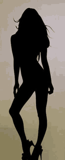 a silhouette of a woman with long hair and high heels standing on one leg .