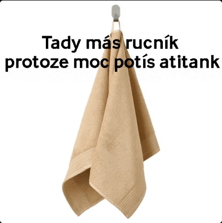 a tan towel is hanging on a hook with the words tady mas ruchnik protoze moc potis atitank written above it