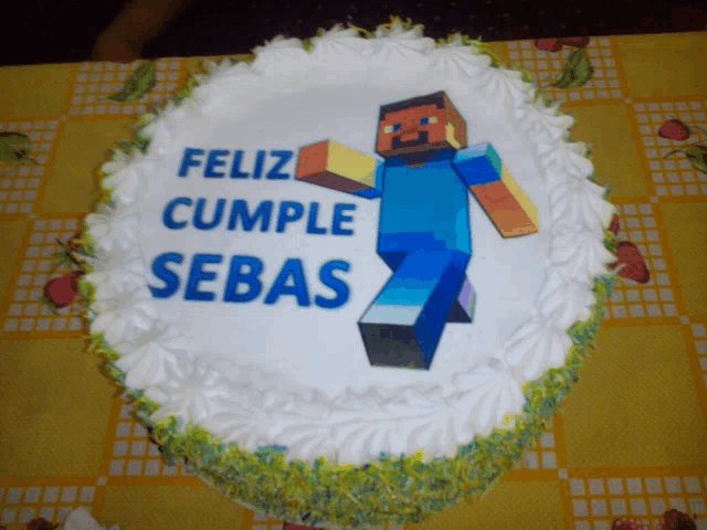 a cake that says feliz cumple sebas with a picture of steve on it