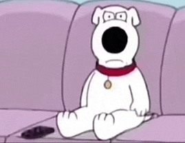 a cartoon dog is sitting on a couch with a remote control .