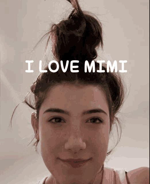 a girl with her hair in a bun and the words i love mimi above her