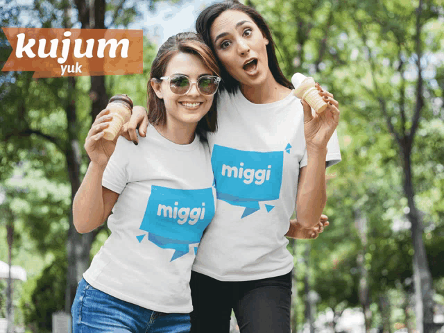 two women holding ice cream cones and wearing matching shirts that say miggi