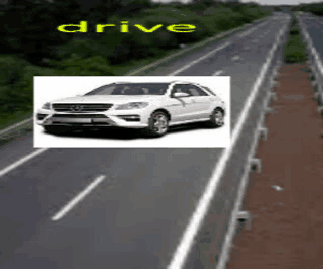 a white car is driving down a highway with the word drive above it