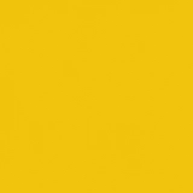 a close up of a yellow background with a plain yellow texture .