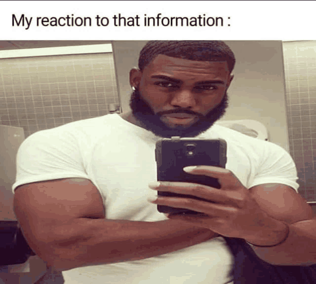 a man taking a selfie in a bathroom with a caption that says my reaction to that information