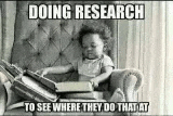 a baby is sitting in a chair reading a book and a meme about doing research .