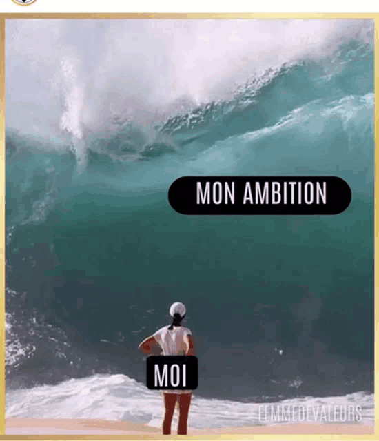 a woman standing in front of a large wave with a sign that says mon ambition on it