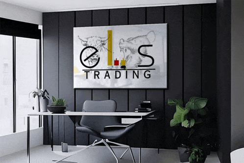 a black wall with a picture of a bull and bear and the words trading on it