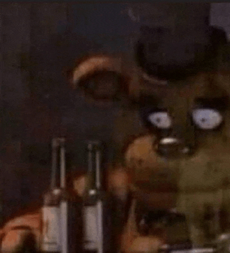 freddy fazbear from five nights at freddy 's is holding a bottle of wine .