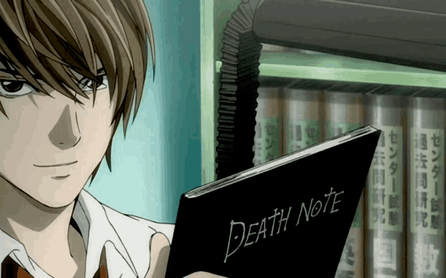 a man holding a death note in front of a shelf of books