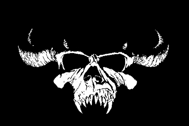 a black and white drawing of a skull with horns and teeth on a black background .