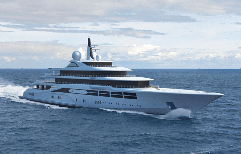 a large white yacht is floating on top of the ocean