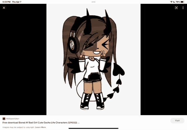 a girl with horns and headphones is shown on a phone screen