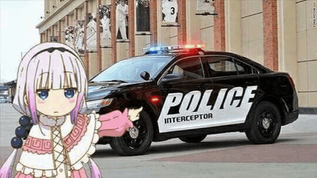 a police car is parked in front of a building with a girl in front of it .