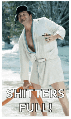 a man in a bathrobe is holding a hose with the words " shitters full " above him