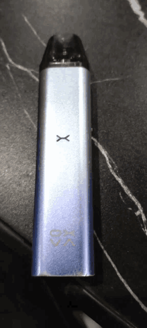 a blue device with a x on it