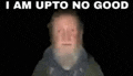 a blurry picture of a man with the words `` i am upto no good '' above him