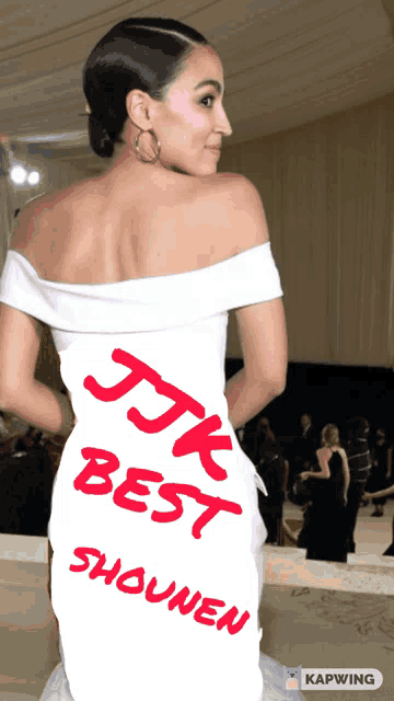 a woman in a white dress with jk best written on the back of her dress