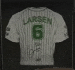 a larsen jersey is displayed in a glass case