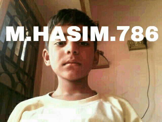 a young boy with the name m.hasim.786 written on the bottom