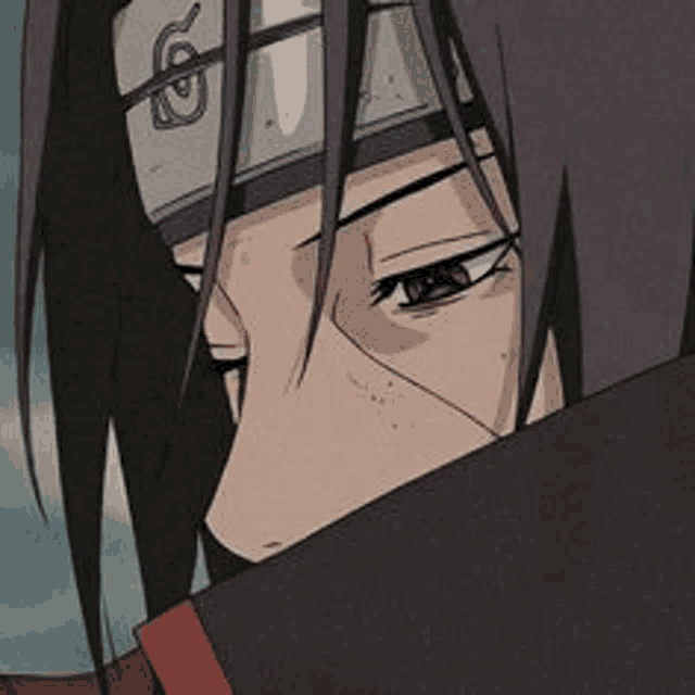 a close up of itachi uchiha from naruto wearing a headband .