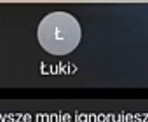 a close up of a button on a computer screen that says t uki .