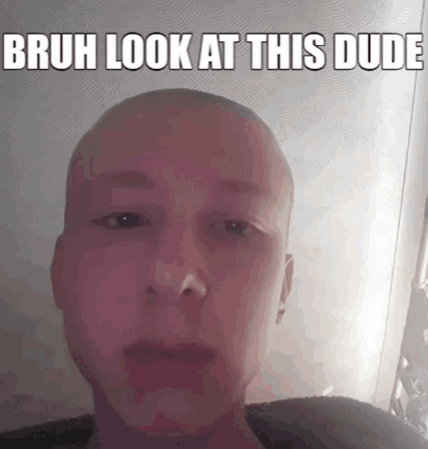 a bald man with the caption bruh look at this dude on his face