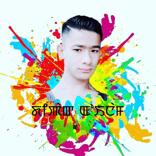 a young man is surrounded by colorful splashes of paint and the words ' nirmal ' on the bottom right corner