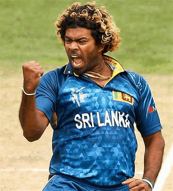 a man wearing a blue shirt that says ' sri lanka ' on it