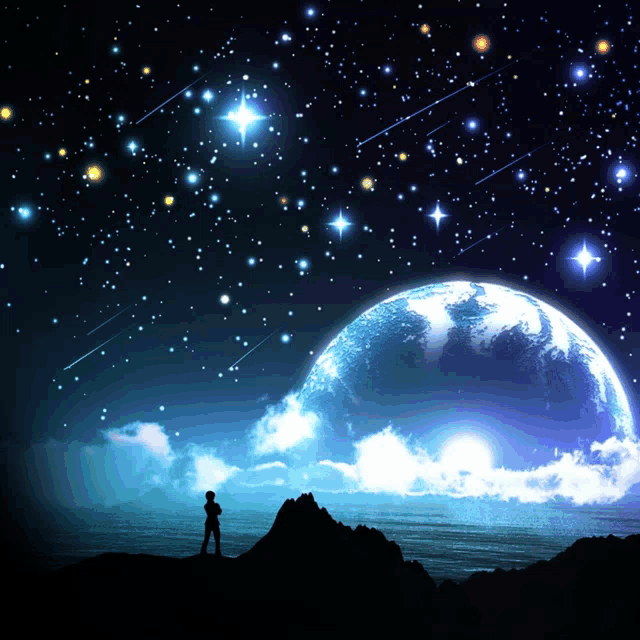 a person standing on top of a mountain looking at a planet