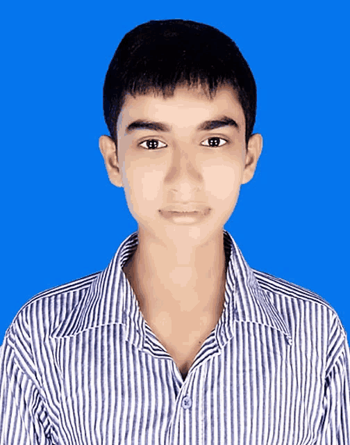 a young man wearing a blue and white striped shirt