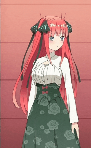 a girl with long red hair is wearing a floral skirt